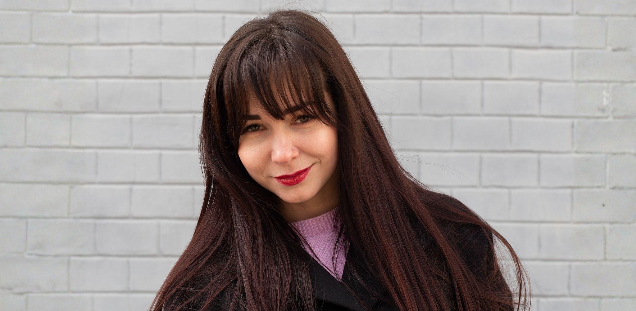A Stylist's Guide to Choosing the Right Long Layers with Bangs