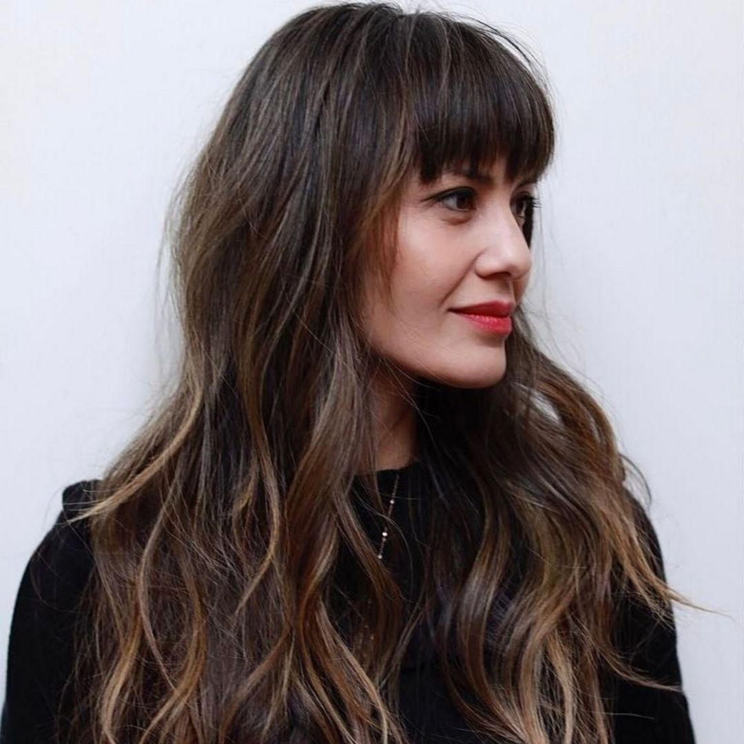 Image of Straight across bangs with choppy layers